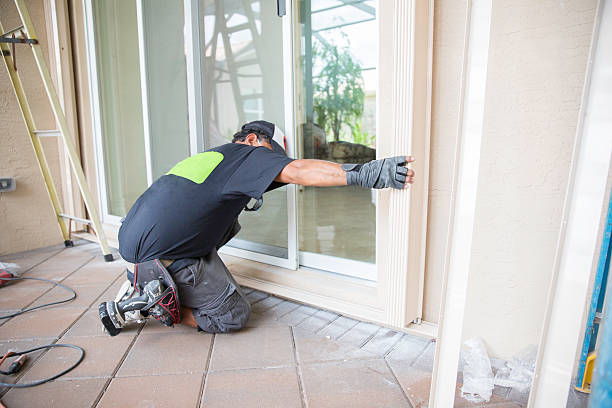 An image of a person working on Hurricane Shutter Replacement in Fort Pierce, FL
